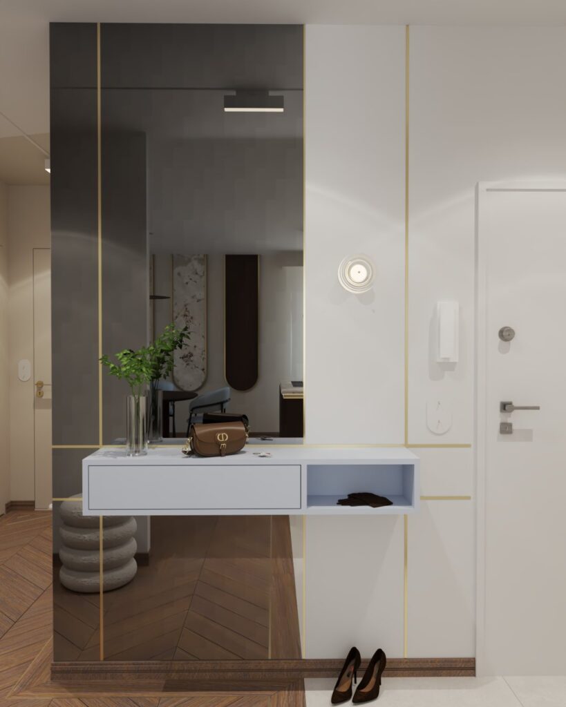 Wejście z designerskim lustrem i minimalistycznym wystrojem